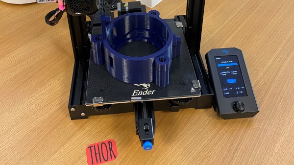 Thor 3D printing a machinery part. 