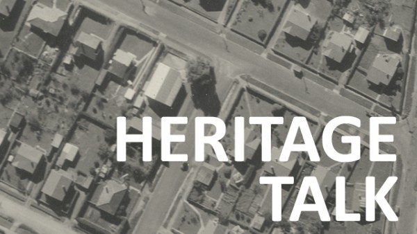 Black and white aerial view of residential neighbourhood with the wordsHeritage Talk
