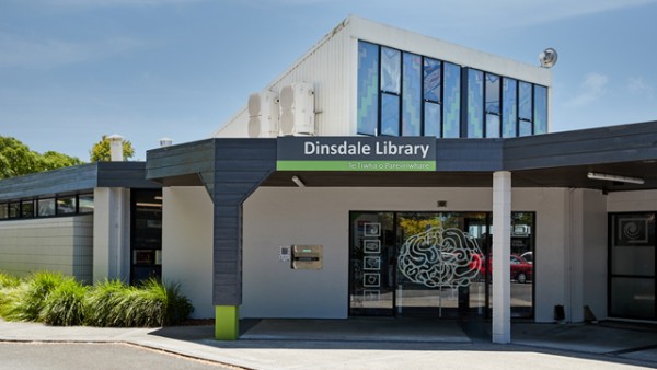 The entrance to Dinsdale Library opens wide with automatic sliding doors.