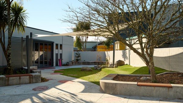 The courtyard at Chartwell Library is accessible through doors inside in the library and it has flat, clear pathways.
