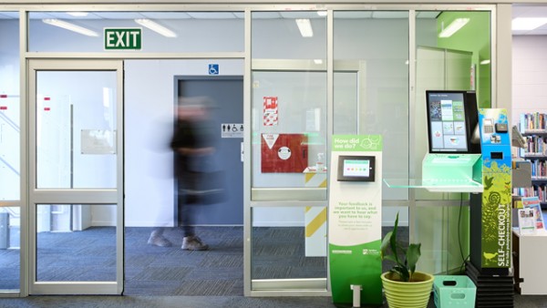 The toilets are located on the left side as you enter the library, before you go through the second set of doors. 